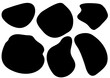 set of abstract black shapes in the form of spots on a white background