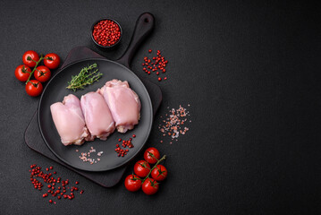 Wall Mural - Fresh raw chicken thigh fillets with salt, spices and herbs