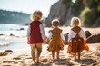 © Irina - Rear view of a group of unrecognizable children walking on the coast with clear blue water and rocky cliffs under a clear sky.