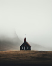 A Picturesque Church With A Steeple Standing Proudly In A Serene Field