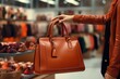 © Parvez - The female hand chooses a leather bag in a department store. High quality photo