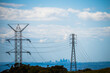 Los Angeles skyline through power lines and towers
