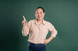 © 1112000 - Gangang middle-aged Asian female portrait posing on blue background