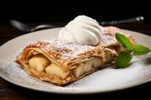 Traditional Austrian apple strudel topped with sweet cream on a plain backdrop. Generative AI