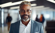 © visoot - portrait of mature middle aged businessman in office.