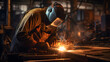 © seesulaijular - The welder is welding the various parts of the house construction in a factory.