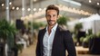 © Fred - Portrait of a male event planner at a bustling event planning agency orchestrating seamless and unforgettable gathisings