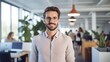 © Fred - Portrait of a male social media manager in a fast-paced digital marketing agency crafting engaging social media content