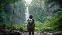 Adventure Woman Travelers Exploring Amazing Hidden Waterfall In Forest, Traveling Along Mountains And Rain Forest