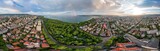 Fototapeta Tęcza - Stunning panorama of the city and rainbow over the sea