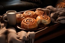 A Tray Of Cinnamon Buns And A Cup Of Coffee. Digital Image.