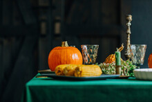 Thanksgiving Dinner With Decoration On Dining Table