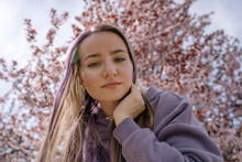 Woman With Hand In Hair At Cherry Blossom Park