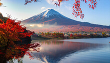 Colorful Autumn Season And Mountain Fuji With Morning Fog And Red Leaves At Lake Kawaguchiko
