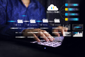 Businessman developer working on cloud data management kanban board frame work on laptop computer progression agile software data base development and binary fall down to keypad download and upload