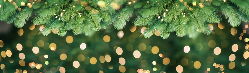 Wall Mural - merry christmas and new year holidays background. blurred bokeh background with light bulbs and chri