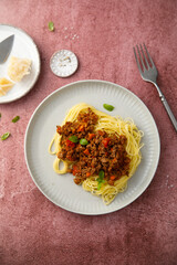 Wall Mural - Traditional spaghetti Bolognese with fresh basil