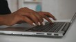 © kinomaster - Closeup shot of the woman at the desk, focus on female model hands typing on laptop keyboard.