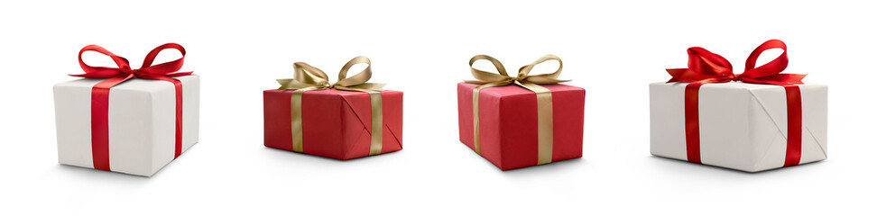 a collection of red and white gift wrapped presents with a red and gold ribbon bows isolated against