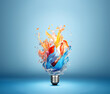 © IBEX.Media - Creative inspiration concept with colorful lightbulb made from liquid glass