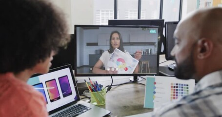 Canvas Print - African american business people on video call with caucasian female colleague on screen