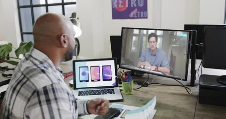 Poster - African american businessman on video call with caucasian male colleague on screen