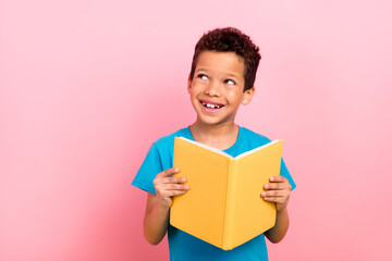 Canvas Print - Photo of dreamy thoughtful small boy wear blue t-shirt enjoying fairytales looking empty space isolated pink color background