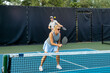 © pics721 - Male Pickleball Player Returns Serve