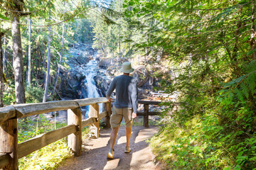 Sticker - Hiker near waterfall