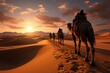 © Muhammad Ishaq - Wide angle view captures camel caravan traversing Sahara Deserts sand dunes