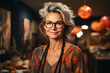 © Bobboz - Middle age craftswoman in her art studio workshop. Female small business entrepreneurs concept.