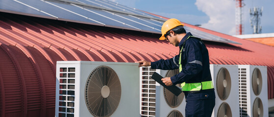 Engineers is checking the air conditioning cooling system of a major building or industrial facility.