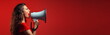© Mickael - An attractive woman speaks into a loudspeaker isolated on red background. woman holding a megaphone on a red background making announcement with copy space. Generative AI.
