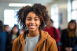Student African American girl girl dresssed with sweatshirt in high school hallway
