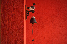 Duck And Bell On The Wall