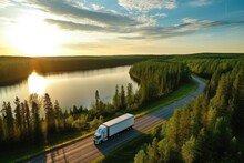 Aerial view of a truck driving along the road at sunset. Aerial view of semi truck with cargo trailer on road curve at lake shore with green pine forest. Transportation background, AI Generated