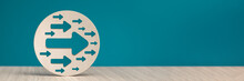 Arrow Pointing Right On A Blue Background. Banner With An Arrow In A Wooden Circle Close-up Pointing To The Right With Copy Space.
