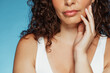 © Prostock-studio - Calm millennial caucasian lady touching perfect face skin with hand, enjoy beauty care