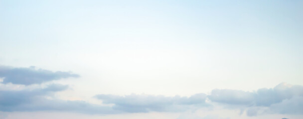 Wall Mural - light blue cyan blurry sky background with light blue clouds