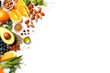 Fresh healthy grocery fruits nuts avocado oranges on white background with empty copy space. Organic products concept
