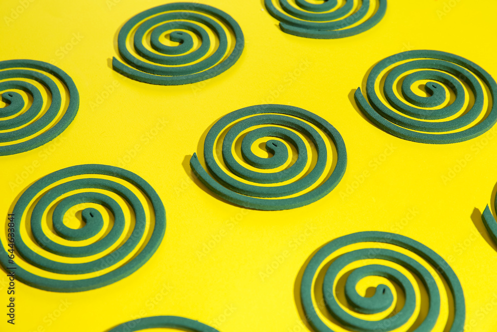 Mosquito spirals on yellow background