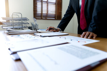 Wall Mural - close up image of manager on desk, executive marketing analyst