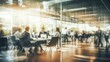 © Parichat - Blurred image of many business people working inside modern office