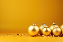 Golden Christmas Ball Decoration On Yellow Background Copy Scape