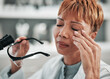 © Talia Mdlungu/peopleimages.com - Stress, headache and science woman in the laboratory closeup with burnout during research or innovation. Anxiety, mental health and fail with a mature doctor in a lab for experiment or investigation