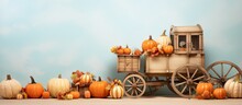 Old Wooden Cart With Pumpkins On Isolated Pastel Background Copy Space