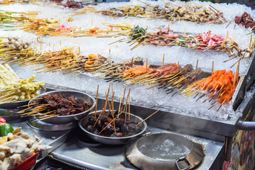 Wall Mural - Many  raw snacks and seafood in Jalan Alor street food in Kuala Lumpur