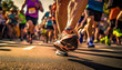 © annebel146 - People running a marathon.Running crowd at the marathon. Many runners passing the start or finish line.focus on feet. Race,sports,health concept background
