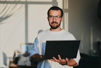 Portrait professional man programmer working concentrated on computer diverse offices. Modern IT technologies, development of artificial intelligence, programs, applications and video games concept