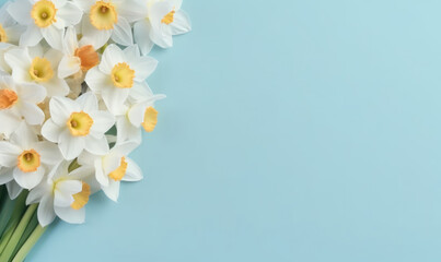  A narcissus flowers bouquet on a pastel blue background with empty copyspace. Mother's Day concept. Created by generative AI